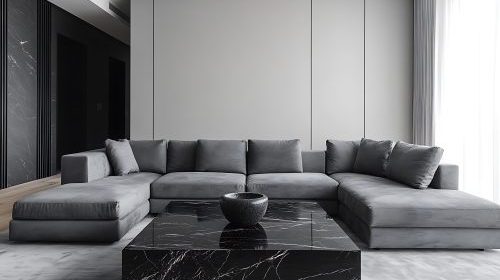 Luxury minimalist living room with an oyster gray sectional and a sleek black marble coffee table